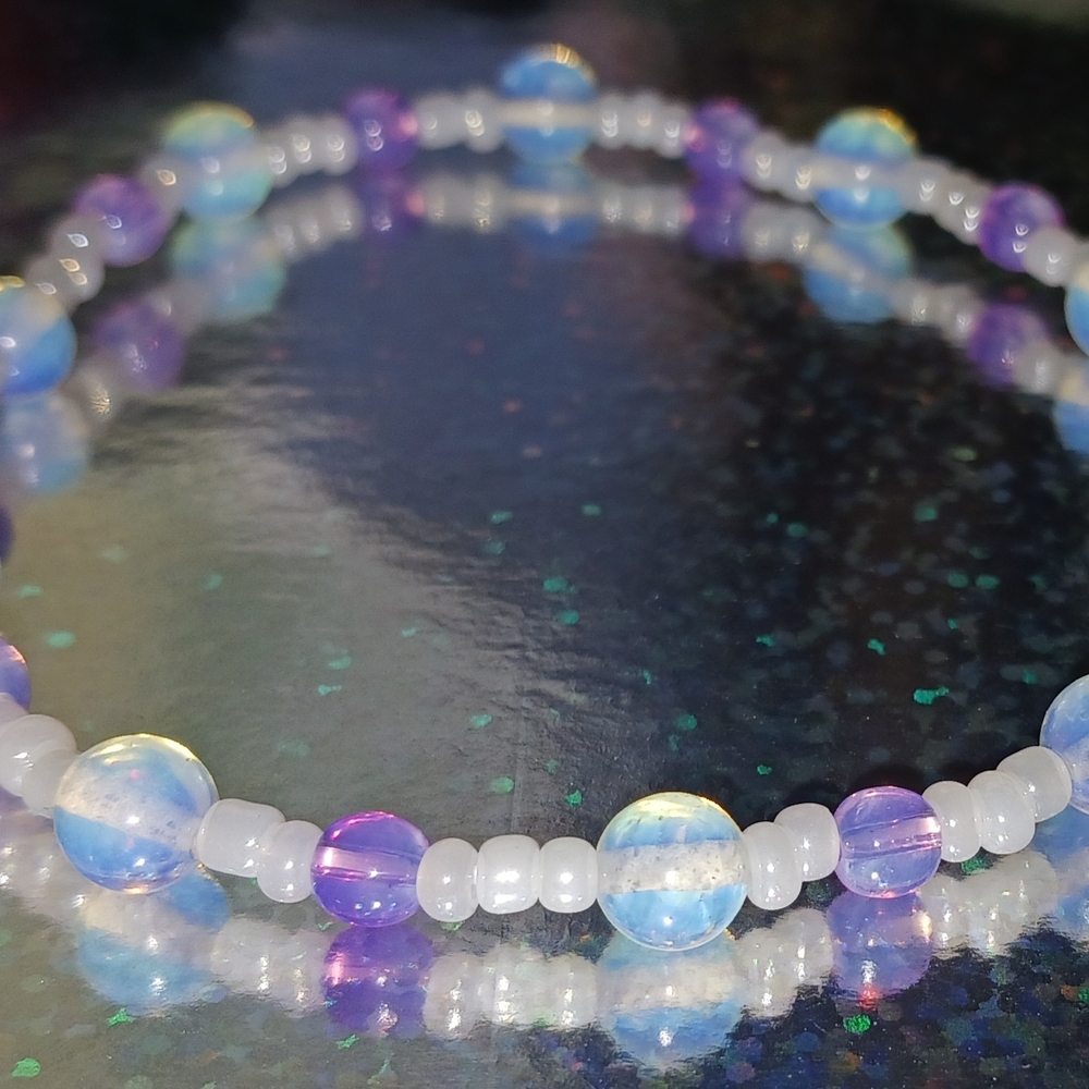 Elegant Opalescent and Purple Beaded Bracelet